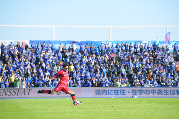 写真：現役時代の本間氏